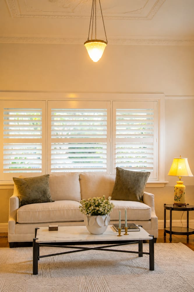 Bright living room with plantation shutters in Fitzroy — Melbourne property video by Melbourne Property Media